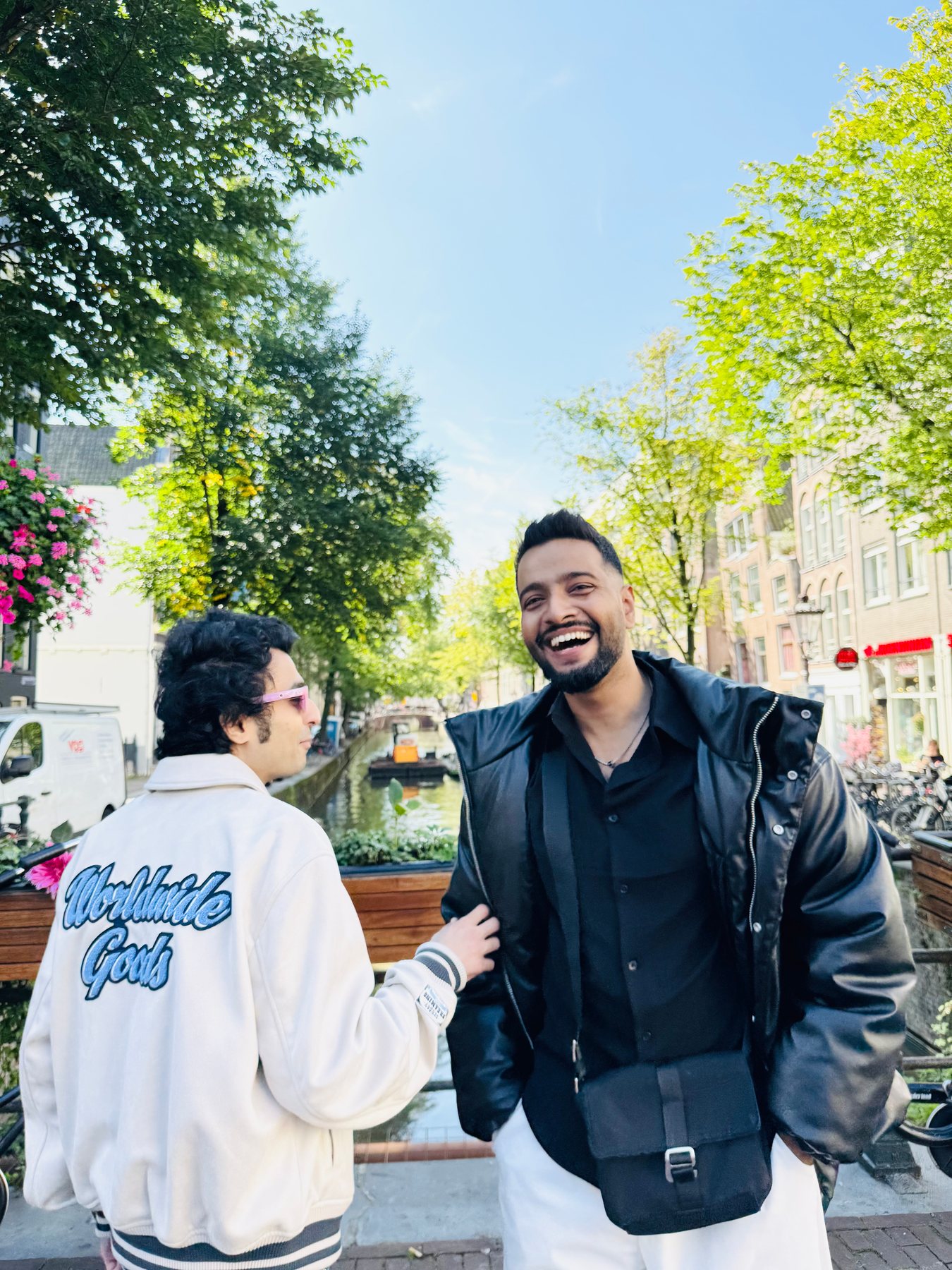 The Backyourtrip founders together beside an Amsterdam canal